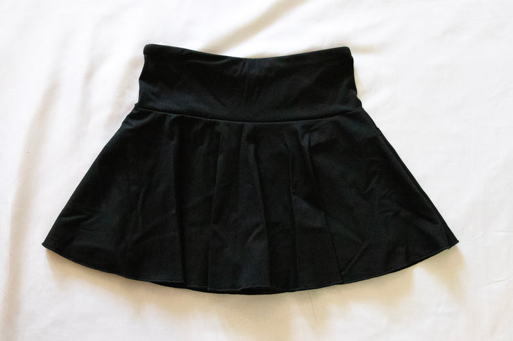 back of black womens tennis skirt