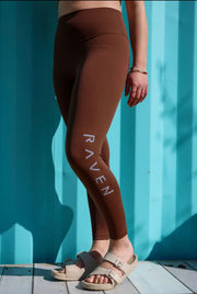 brown leggings with blue logo
