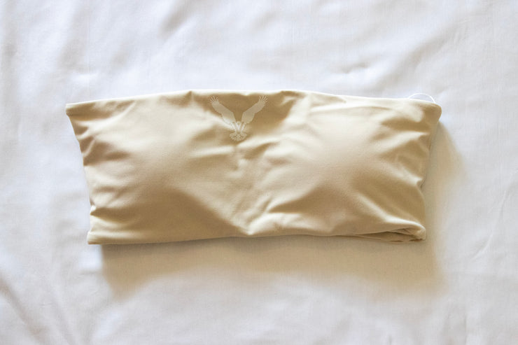 front of cream tube top