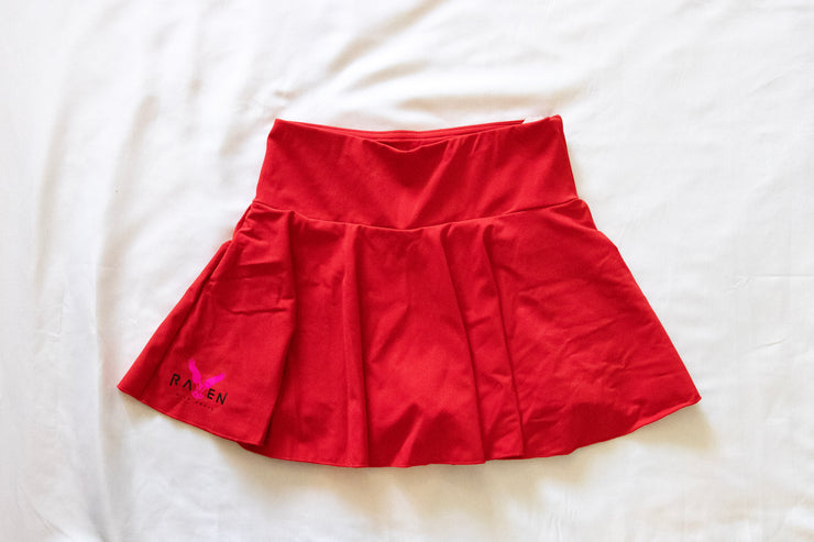 front of red womens tennis skirt